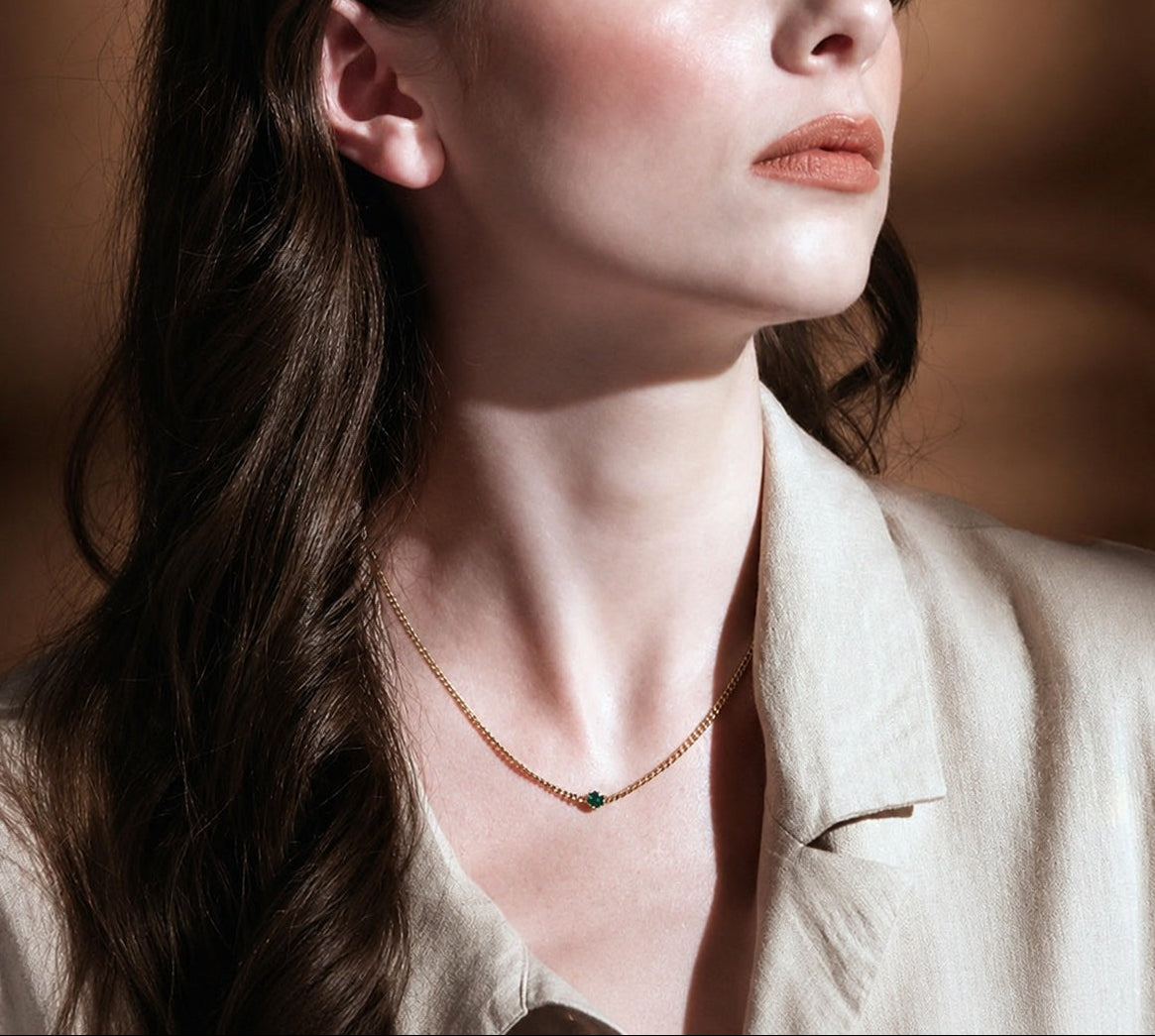 Curb link blue topaz necklace in 14K yellow gold